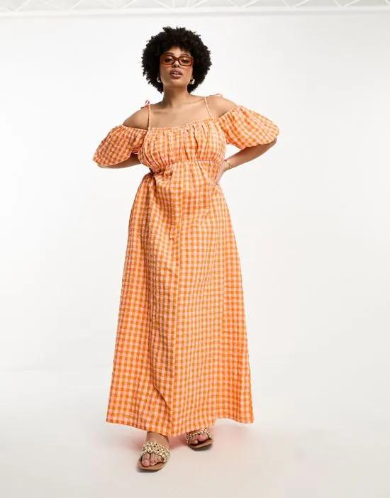 ASOS DESIGN Curve off-shoulder cotton maxi dress with ruched bust detail in pink and orange gingham