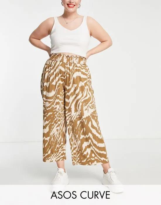 ASOS DESIGN Curve shirred waist culotte pants in animal print