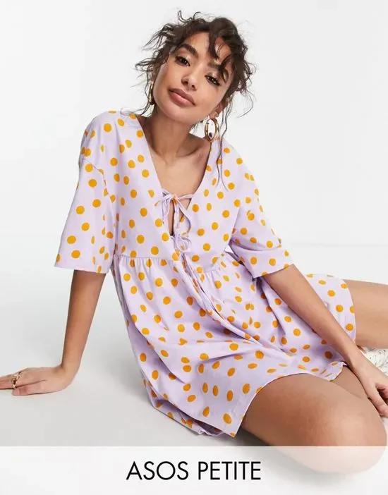 ASOS DESIGN Petite mini smock dress with double tie detail in lilac and orange spot