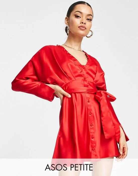 ASOS DESIGN Petite satin batwing mini dress with button detail and tie front in red