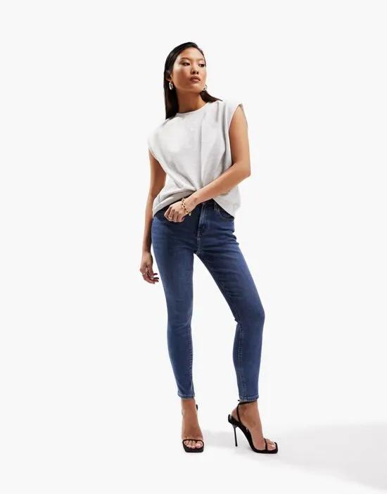 ASOS DESIGN Petite ultimate skinny jeans in authentic mid blue