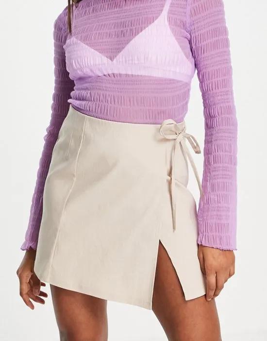 bengaline wrap mini skirt in sand