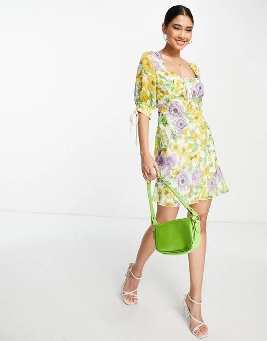 bias chiffon mini dress with tie front in yellow floral print
