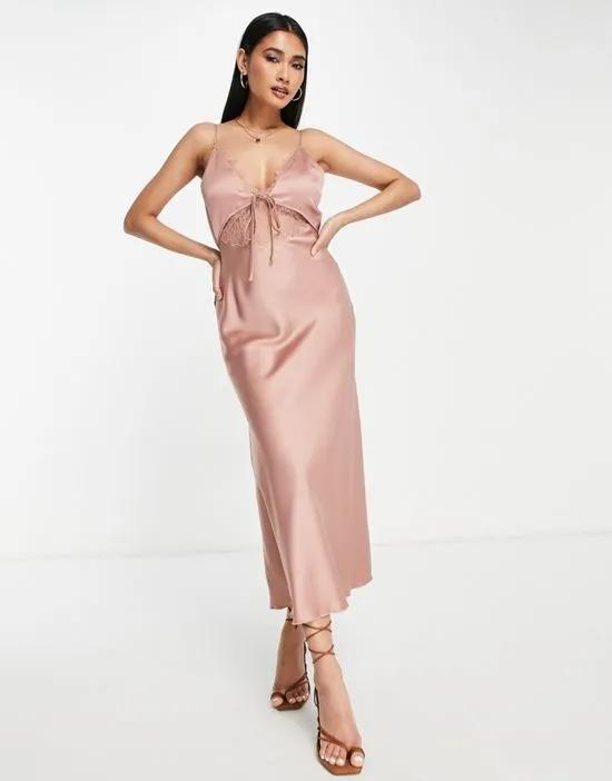 bias satin slip midi dress with delicate lace detail and tie front in blush