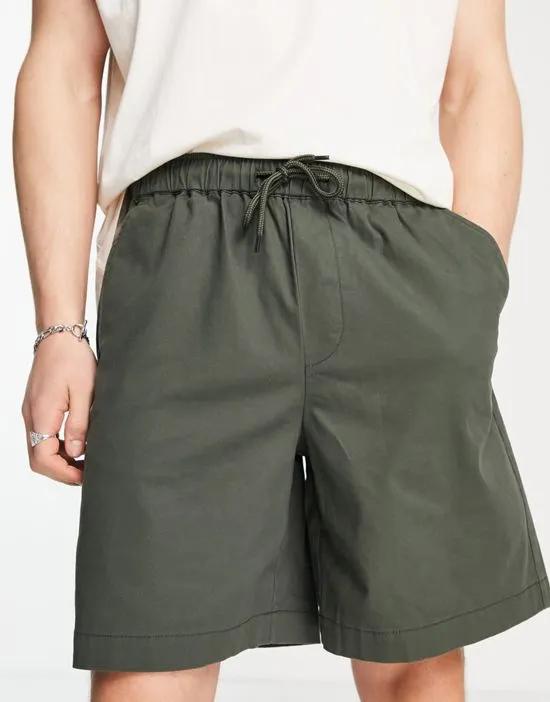 boxy chino shorts in dark green