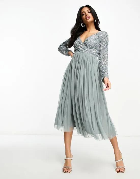 Bridesmaid wrap front midi dress with mutli colored embroidery and embellishment in misty green