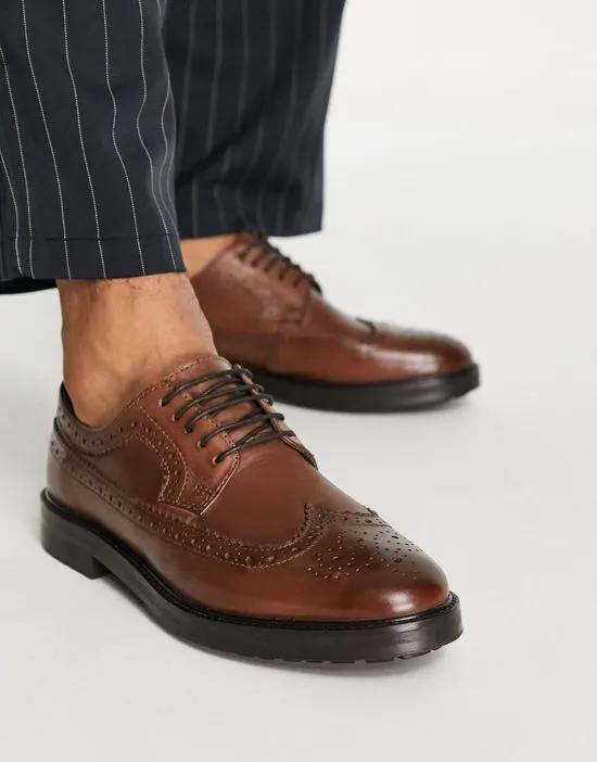 brogue shoes with chunky sole in brown leather