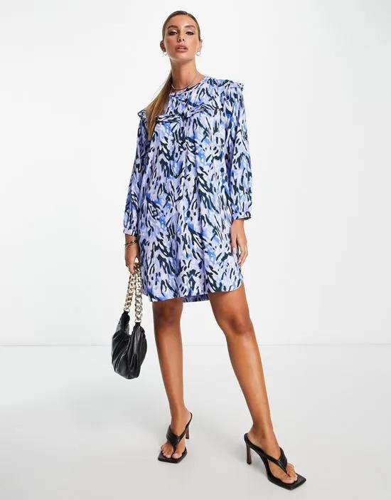 button front mini dress with shoulder detail in blue abstract print