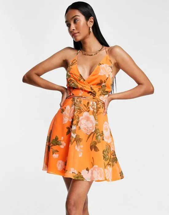 cami wrap mini dress with lace up back in orange floral