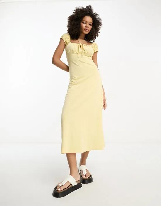 cap sleeve ruched midi dress with tie detail in lemon
