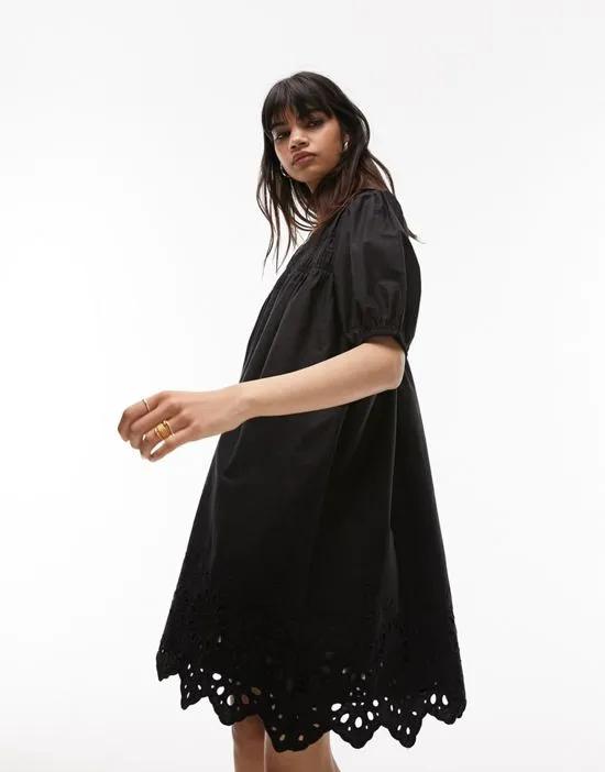 channeled mini chuck on dress with broderie trim in black