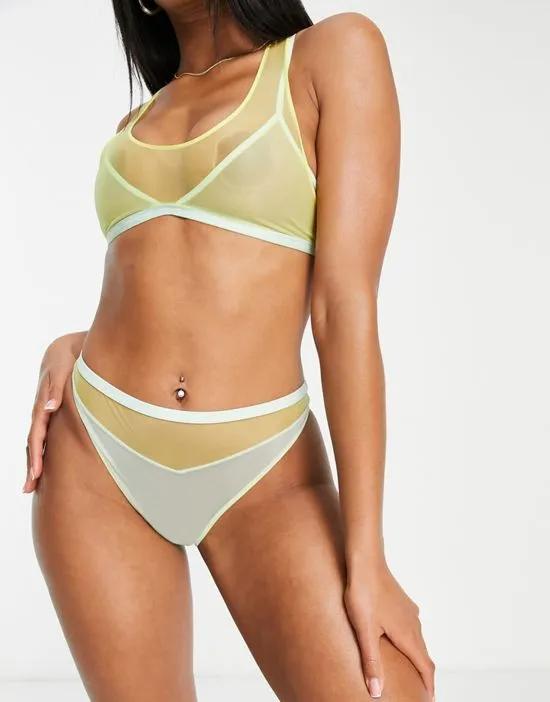 CK One Pride Mesh high waist tanga briefs in yellow and blue color block