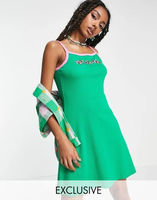 COLLUSION flower embroidered cami mini skate dress in green