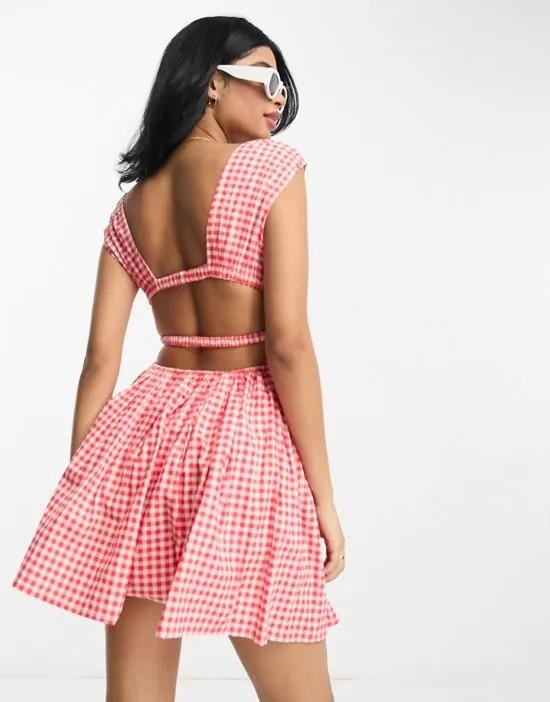 cotton plunge button through mini sundress with elastic channel detail in red gingham