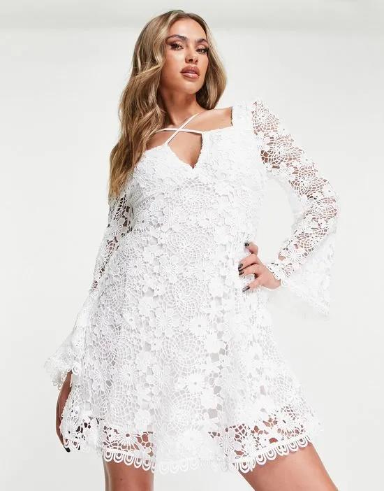 crochet lace cross strap mini dress with flare sleeves in white