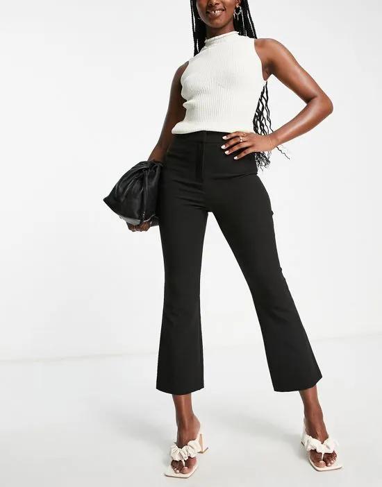 cropped flare pants in black