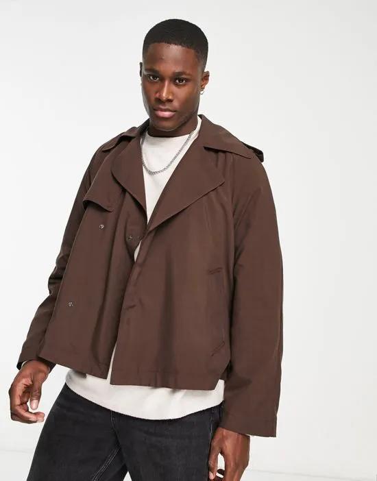 cropped trench coat in brown