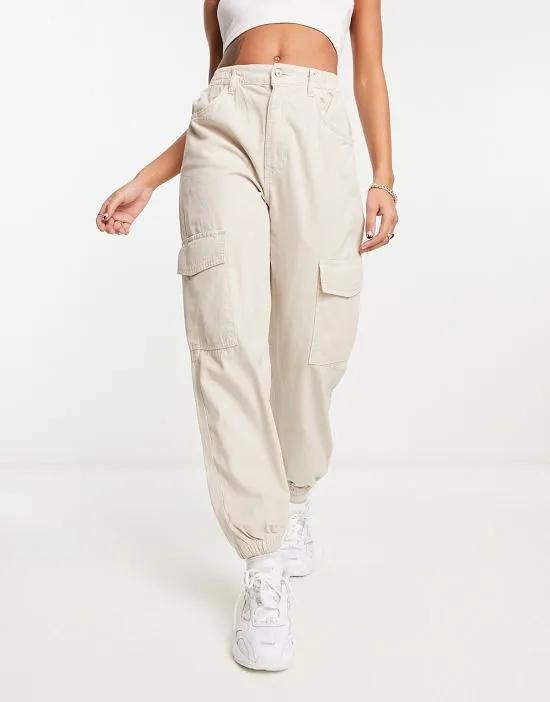 cuffed cargo pants in stone