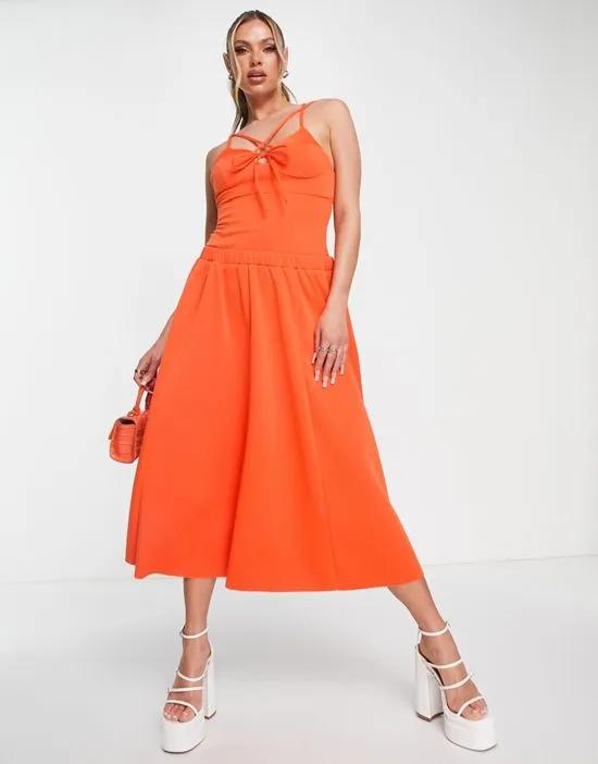 dropped waist strappy midi dress in orange