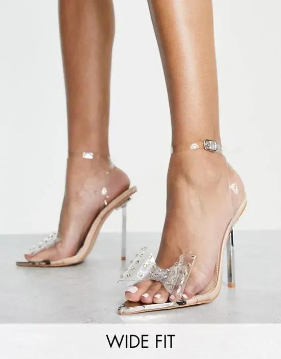 Elevate heeled sandals with bow in clear and beige