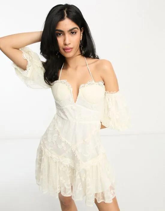 embroidered bardot cupped mini dress with pephem in ivory