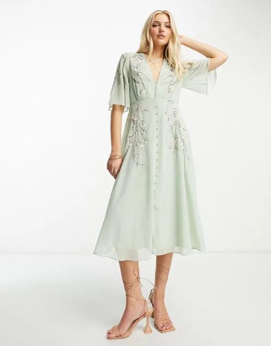 embroidered plunge flutter sleeve midi dress in sage