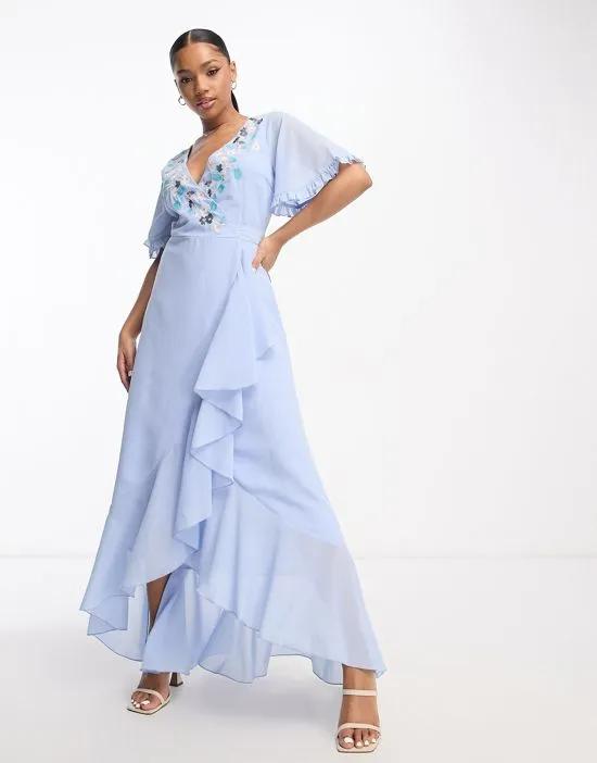 embroidered wrap dress in baby blue