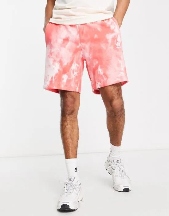 Essentials 8 inch shorts in red tie-dye