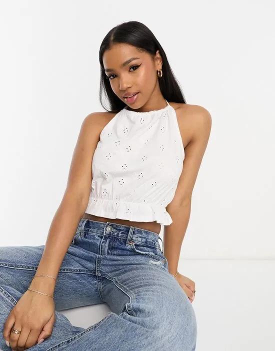 eyelet halter neck cropped top in white