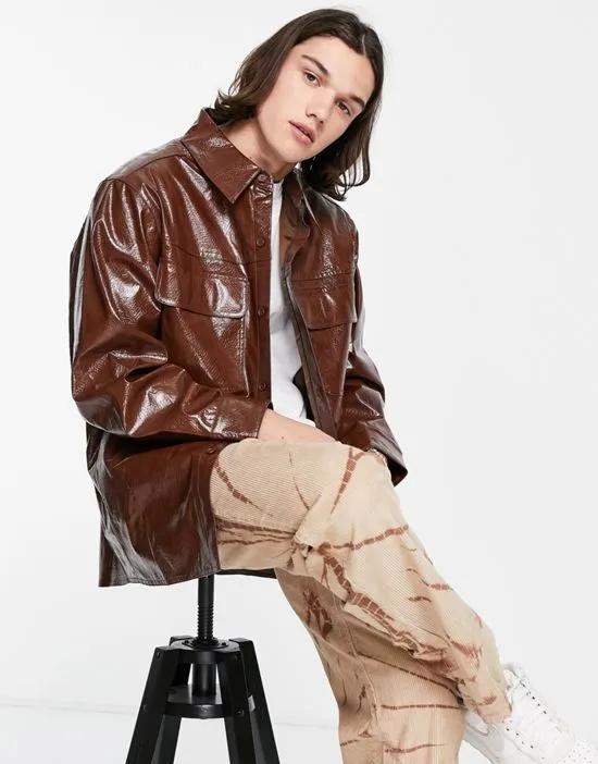 faux leather shacket in embossed brown snake print