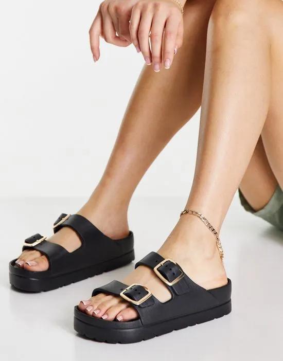 Fawn flatform jelly mules in black