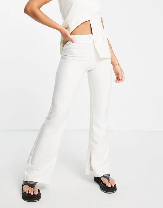 flare pants in ivory