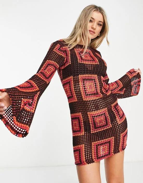 flare sleeve crochet mini dress in black with pink and orange square