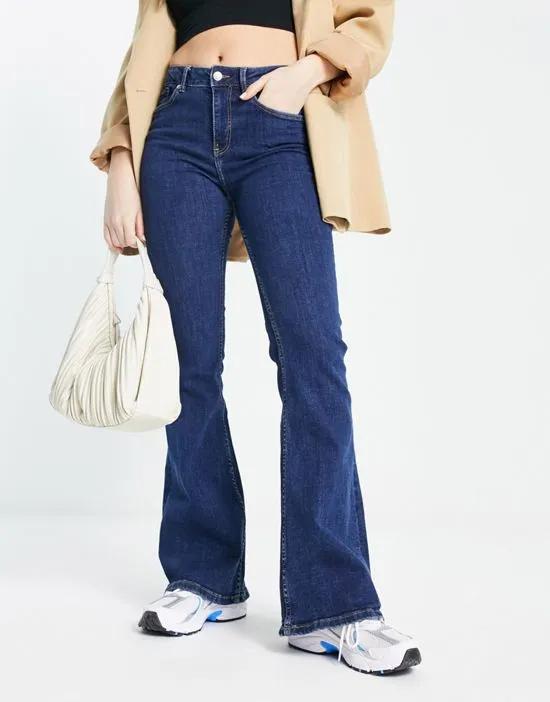 flared jeans in mid blue