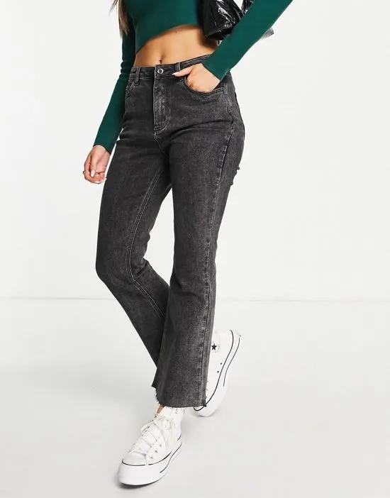 flared jeans with raw edge in black
