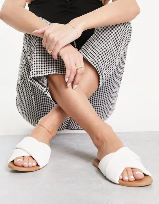 Flock padded flat mules in white