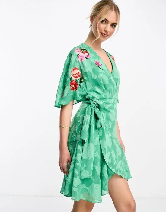 flutter sleeve embroidered sequin mini dress in green