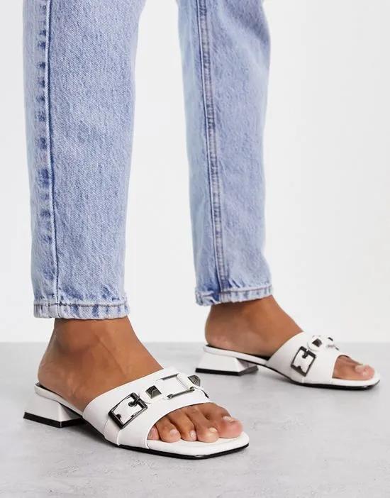 Fortress stud and buckle heeled sandal in off white