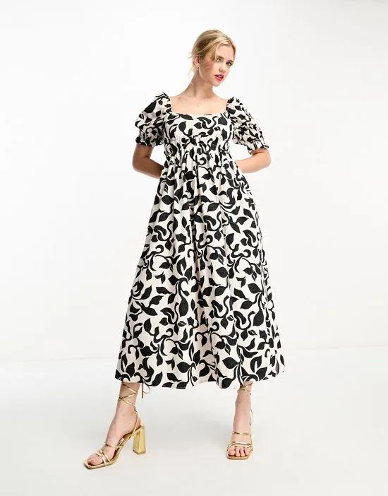 Ginger babydoll midi dress in abstract print