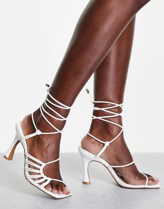 Herald knotted caged tie leg mid heeled sandals in white