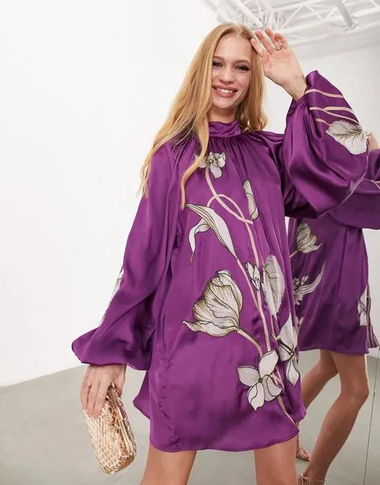 high neck blouson sleeve mini dress in purple in trailing tulip embroidery in purple