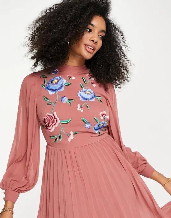 high neck pleated long sleeve skater midi dress with embroidery in dusky pink