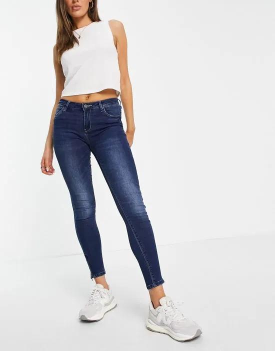 high waisted ankle grazer skinny jeans in blue