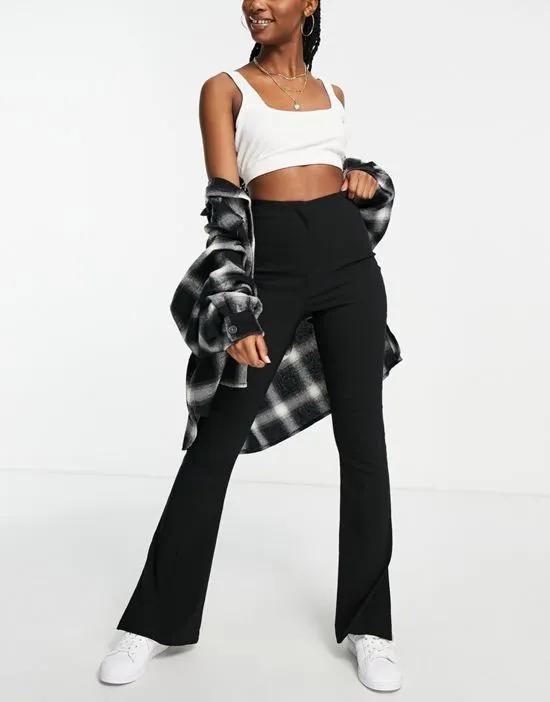 highwaisted bengaline flared pant with side splits in black