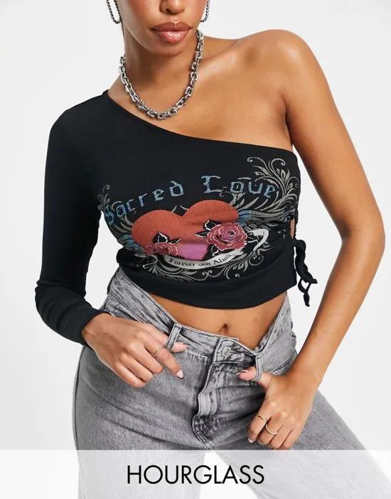 Hourglass one sleeve top with graphic with glitter print sacred love in black