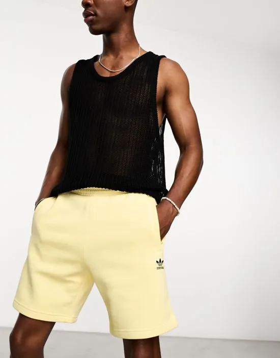 House of Essentials shorts in yellow