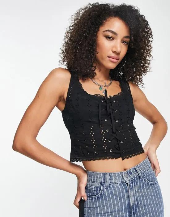 Inspired eyelet cami top with lace up detail in black