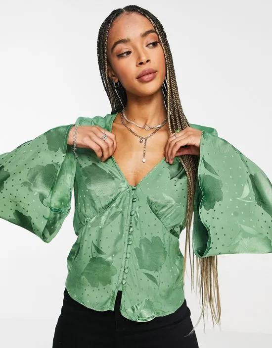 jacquard button front flute sleeve blouse in green