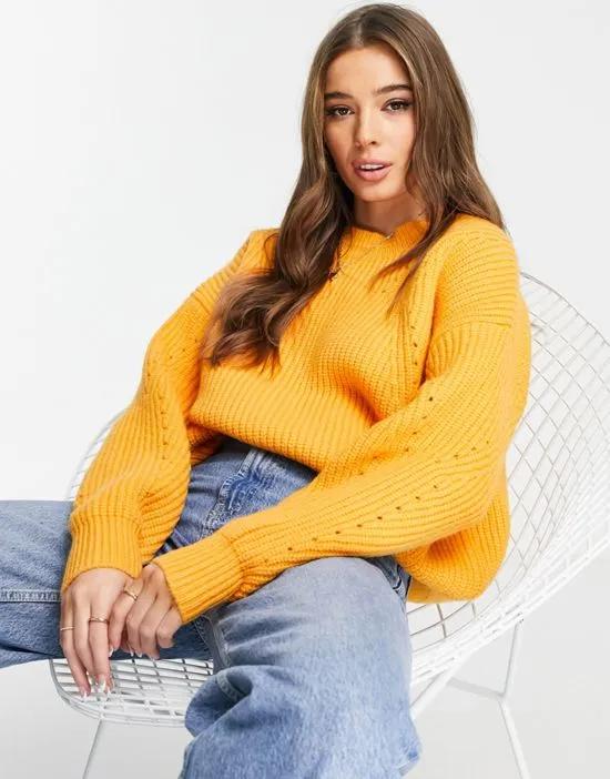 knitted sweater in orange