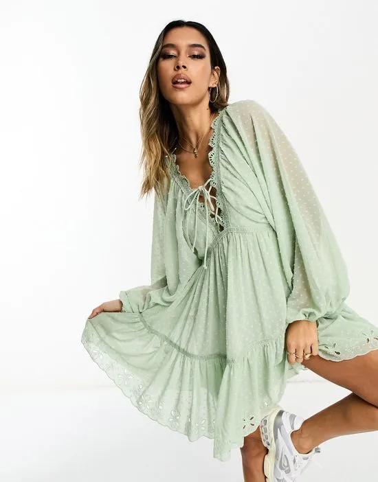 lace trim plunge batwing mini dress with pep hem in sage texture